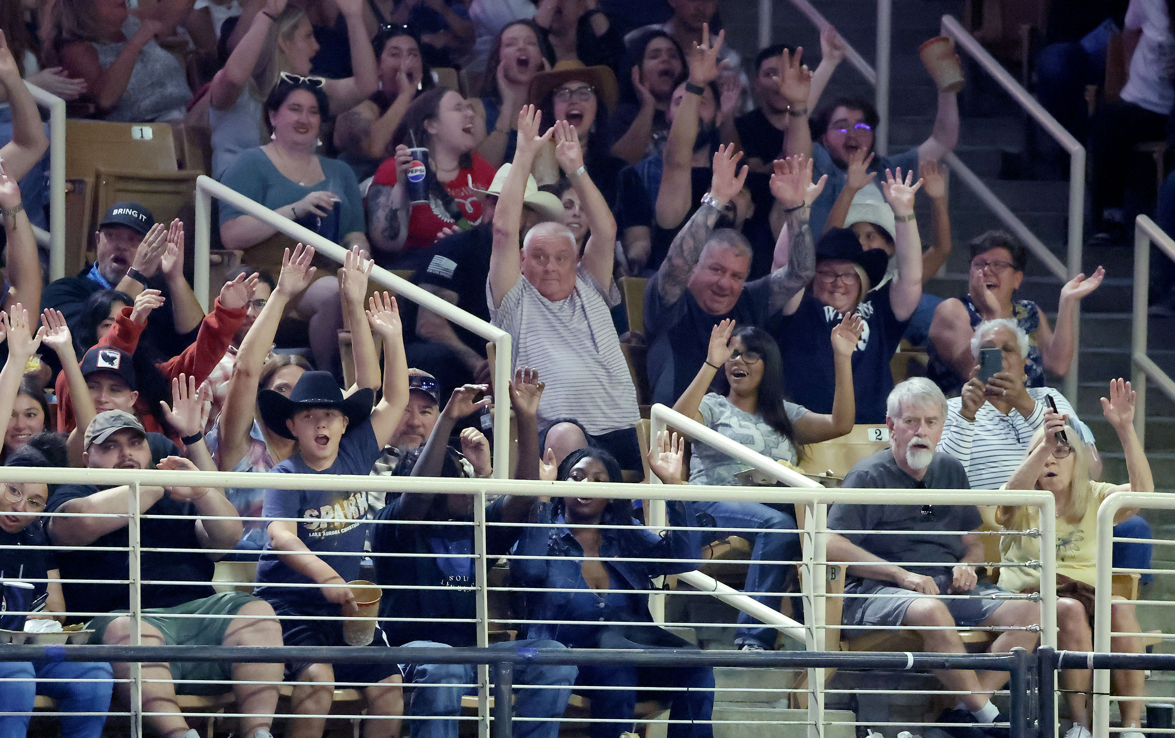 Fans cheer during the Silver Spurs Rodeo at Silver Spurs...