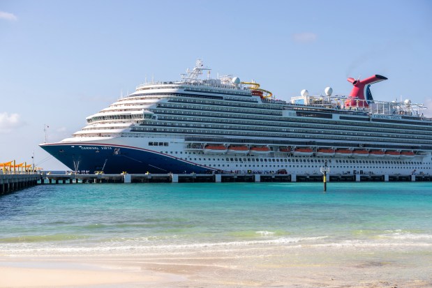 The Carnival Vista docks for the first time at Carnival Cruise Line's Celebration Key on Grand Bahama Island. The 68-acre destination features large freshwater lagoons, a 10-story sandcastle with water slides, Bahamian vendors, swim-up bars and more. (Patrick Connolly/Orlando Sentinel)