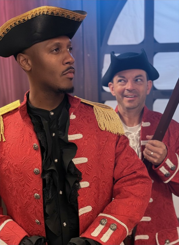 Gregg Baker (foreground) and Brandon Roberts play the British soldiers who are charmed and dizzied by Dolley Madison's "hospitality" in the New Generation Theatrical production of "Dolley. F***ing. Madison." (Courtesy New Generation Theatrical)