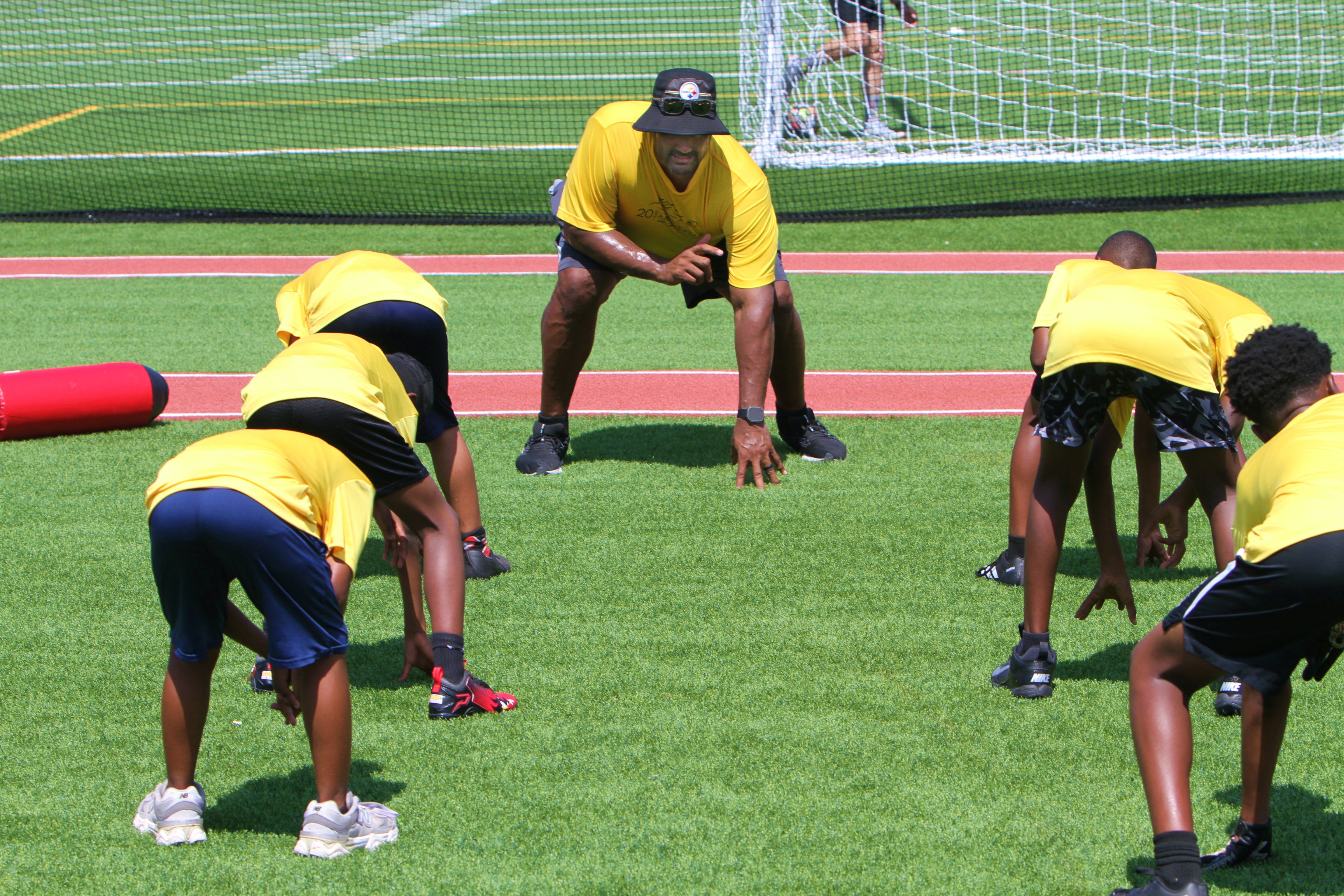 Youngsters go through drills at the 20th Annual Max Starks...