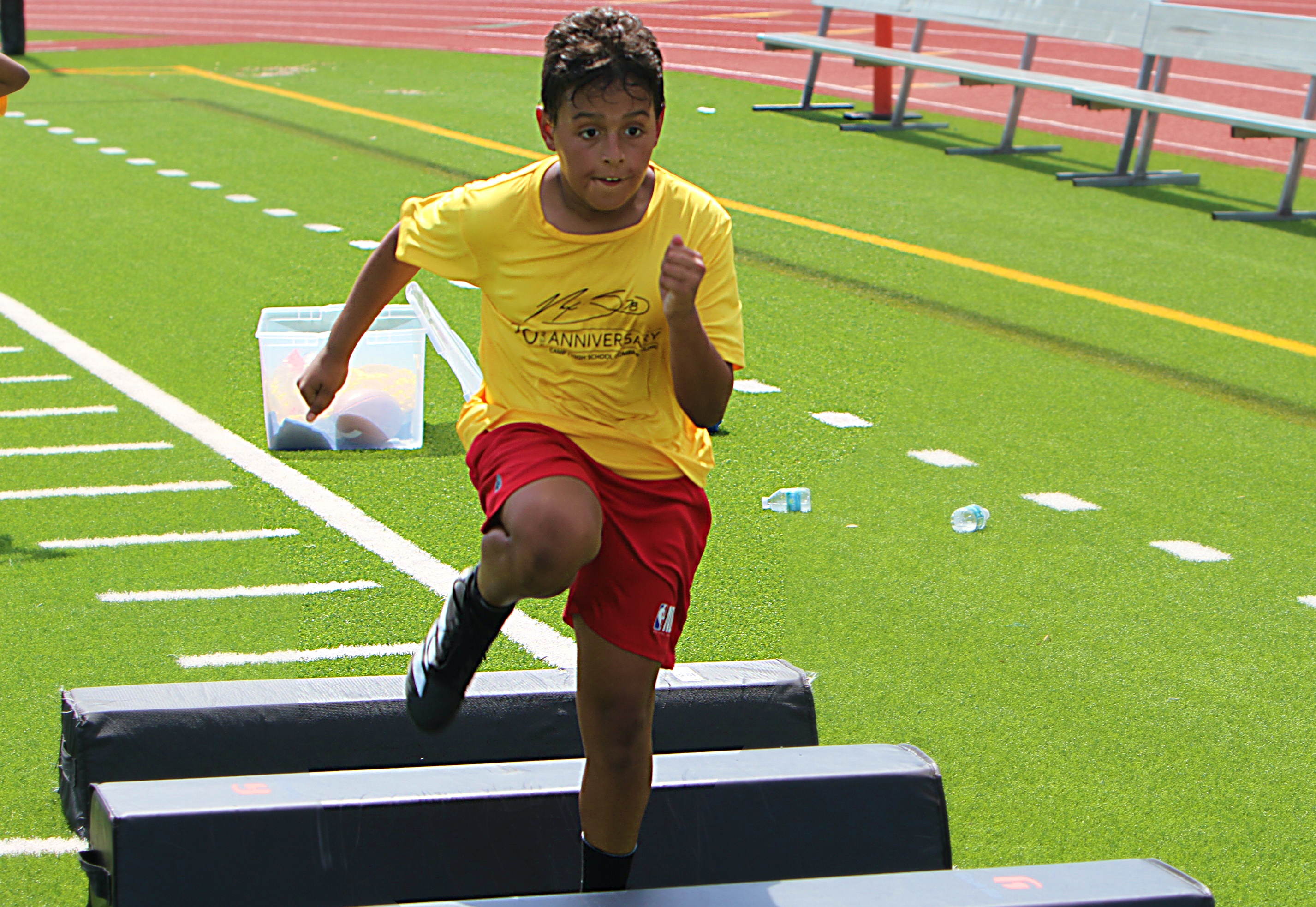 Youngsters go through drills at the 20th Annual Max Starks...