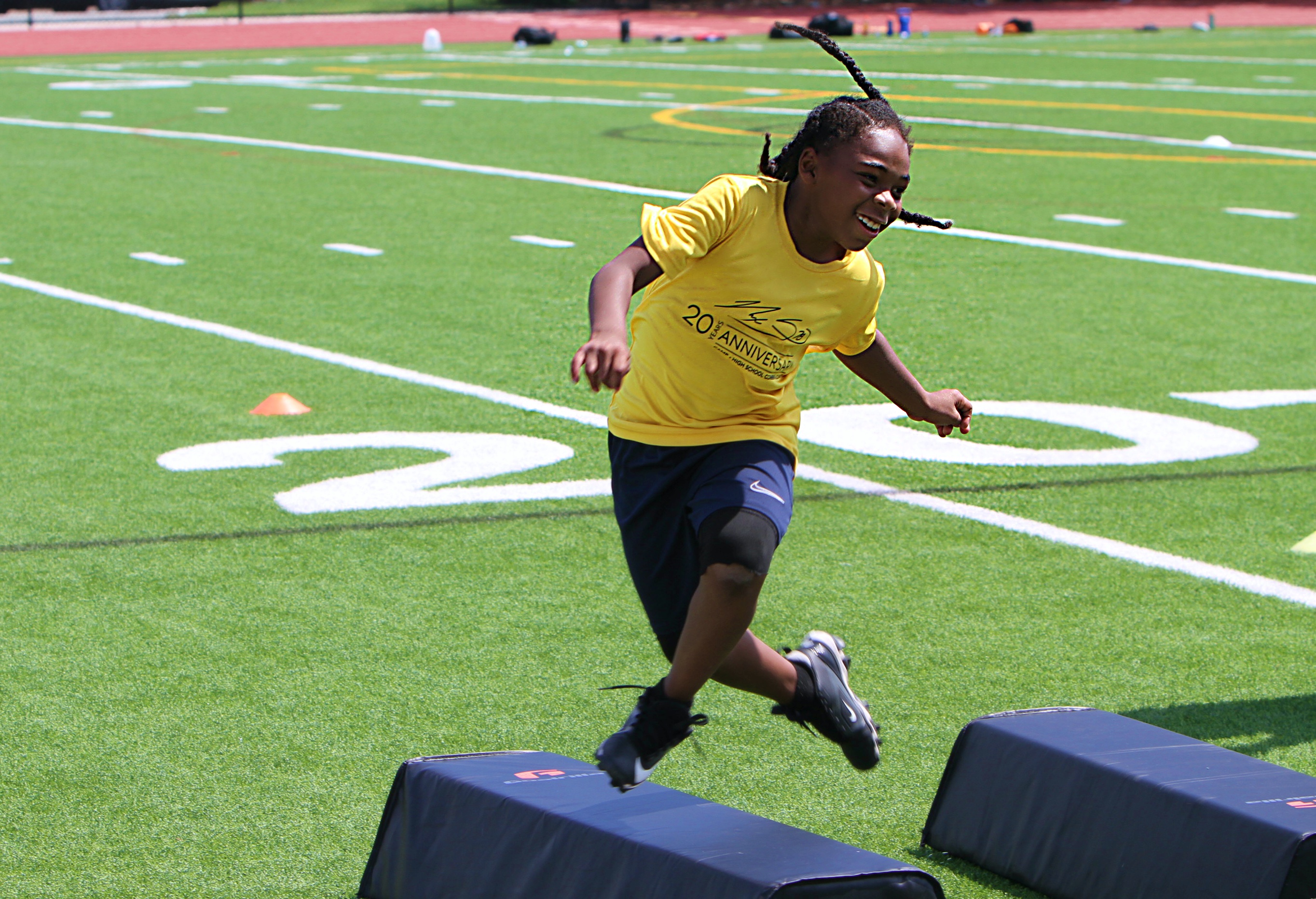 Youngsters go through drills at the 20th Annual Max Starks...