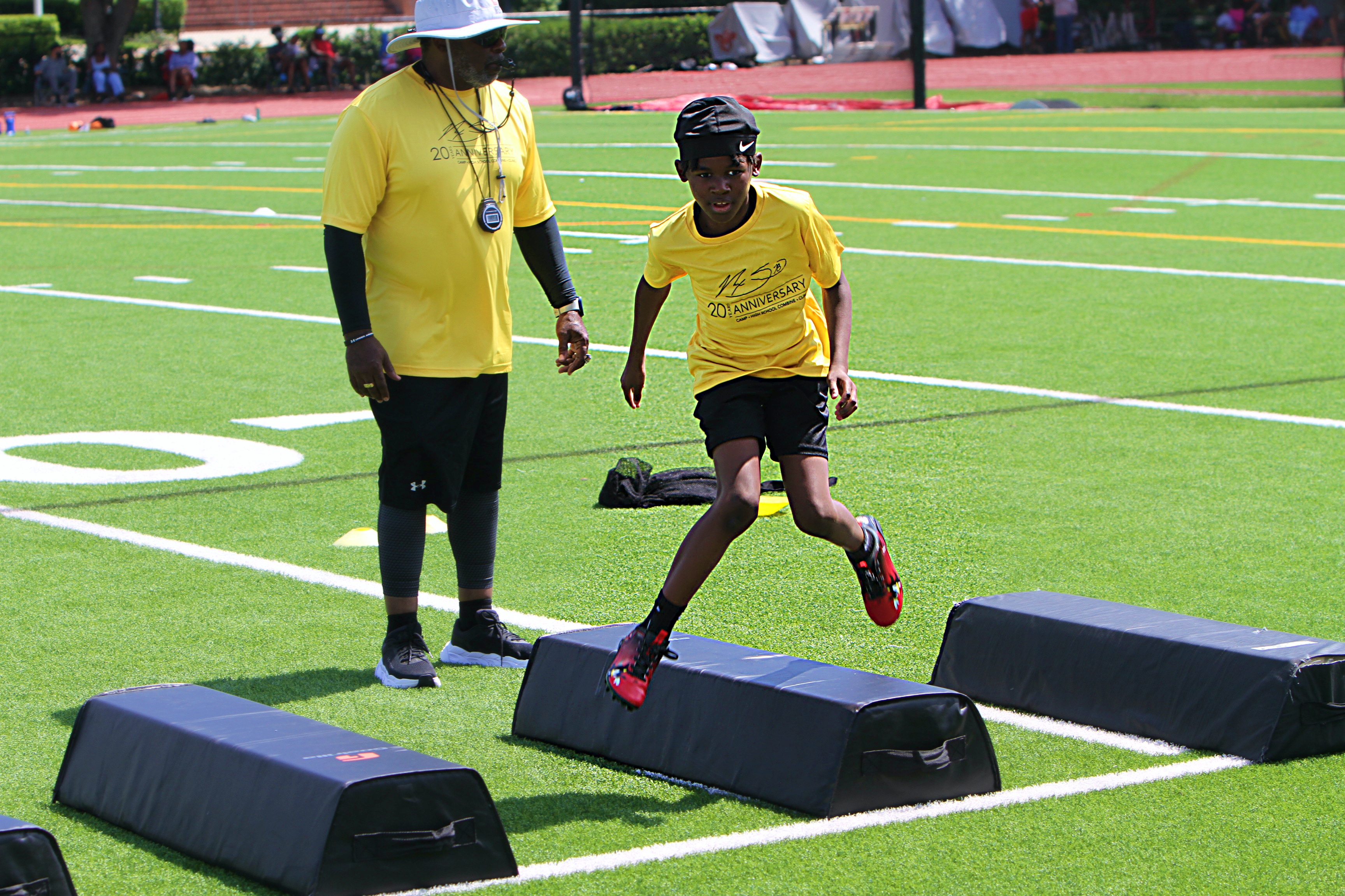 Youngsters go through drills at the 20th Annual Max Starks...