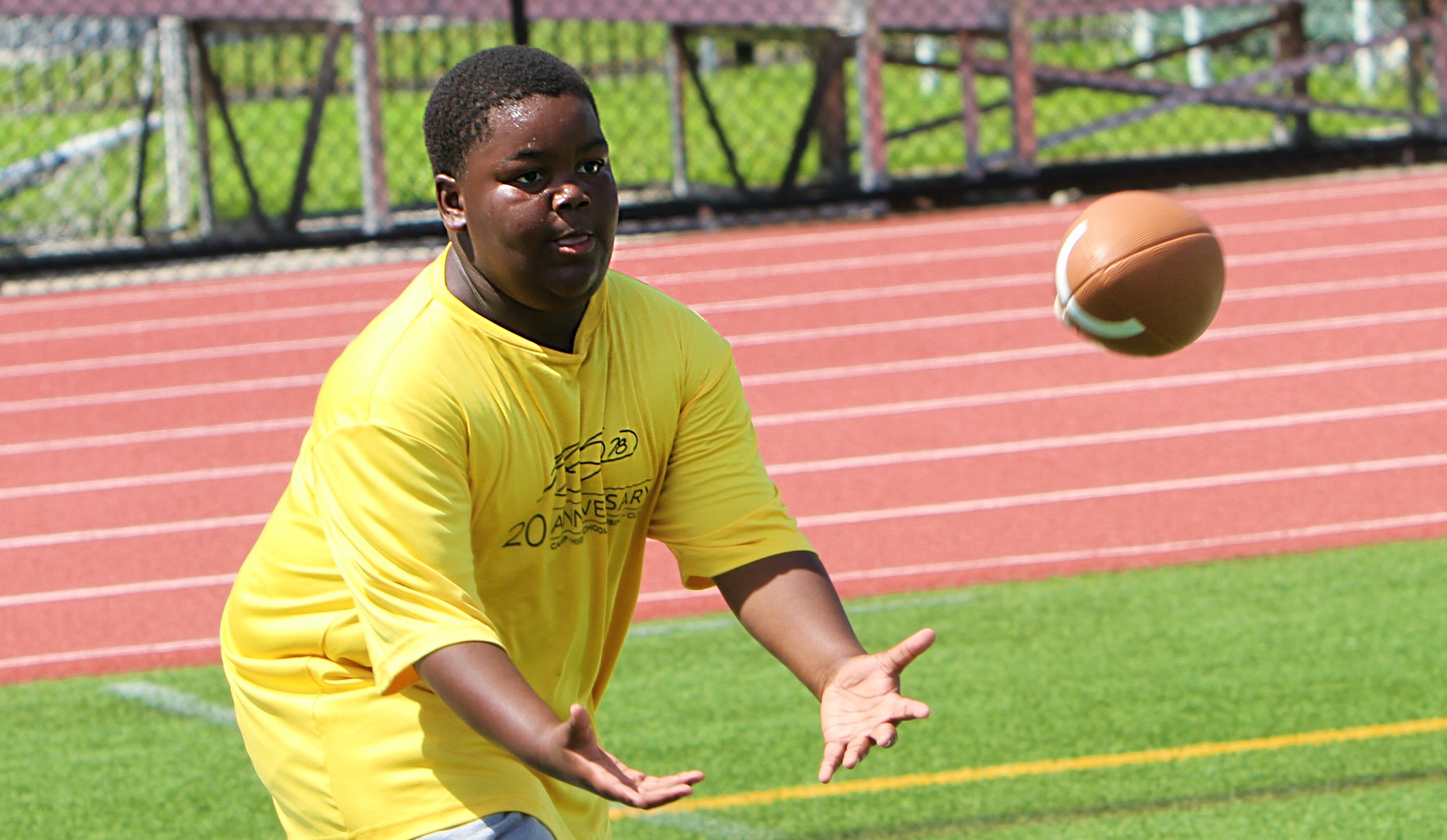 Youngsters go through drills at the 20th Annual Max Starks...