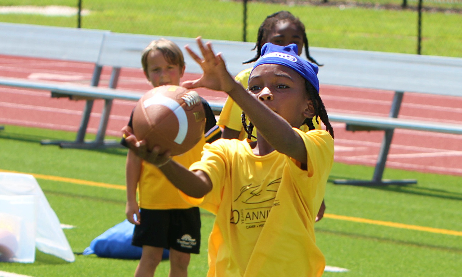 Youngsters go through drills at the 20th Annual Max Starks...