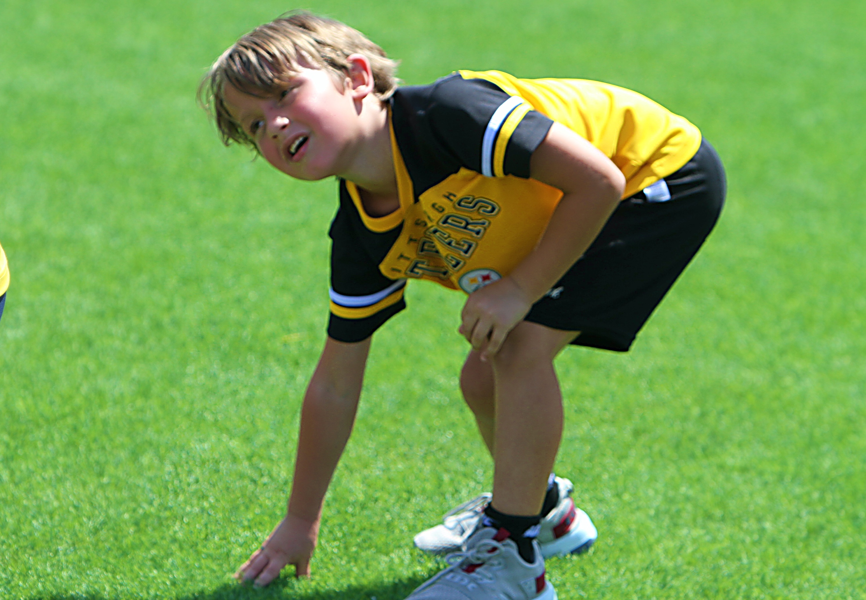 Youngsters go through drills at the 20th Annual Max Starks...