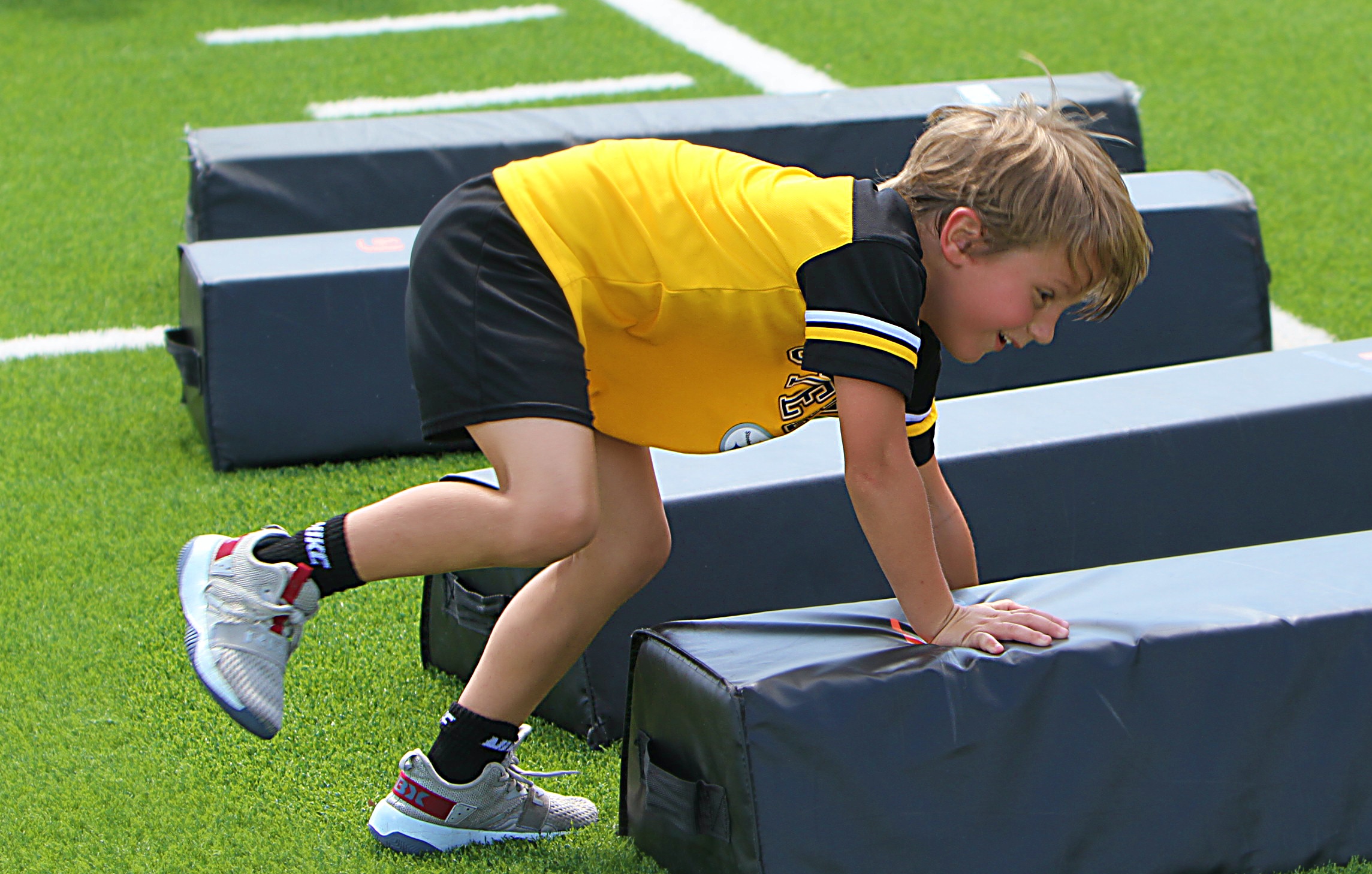 Youngsters go through drills at the 20th Annual Max Starks...