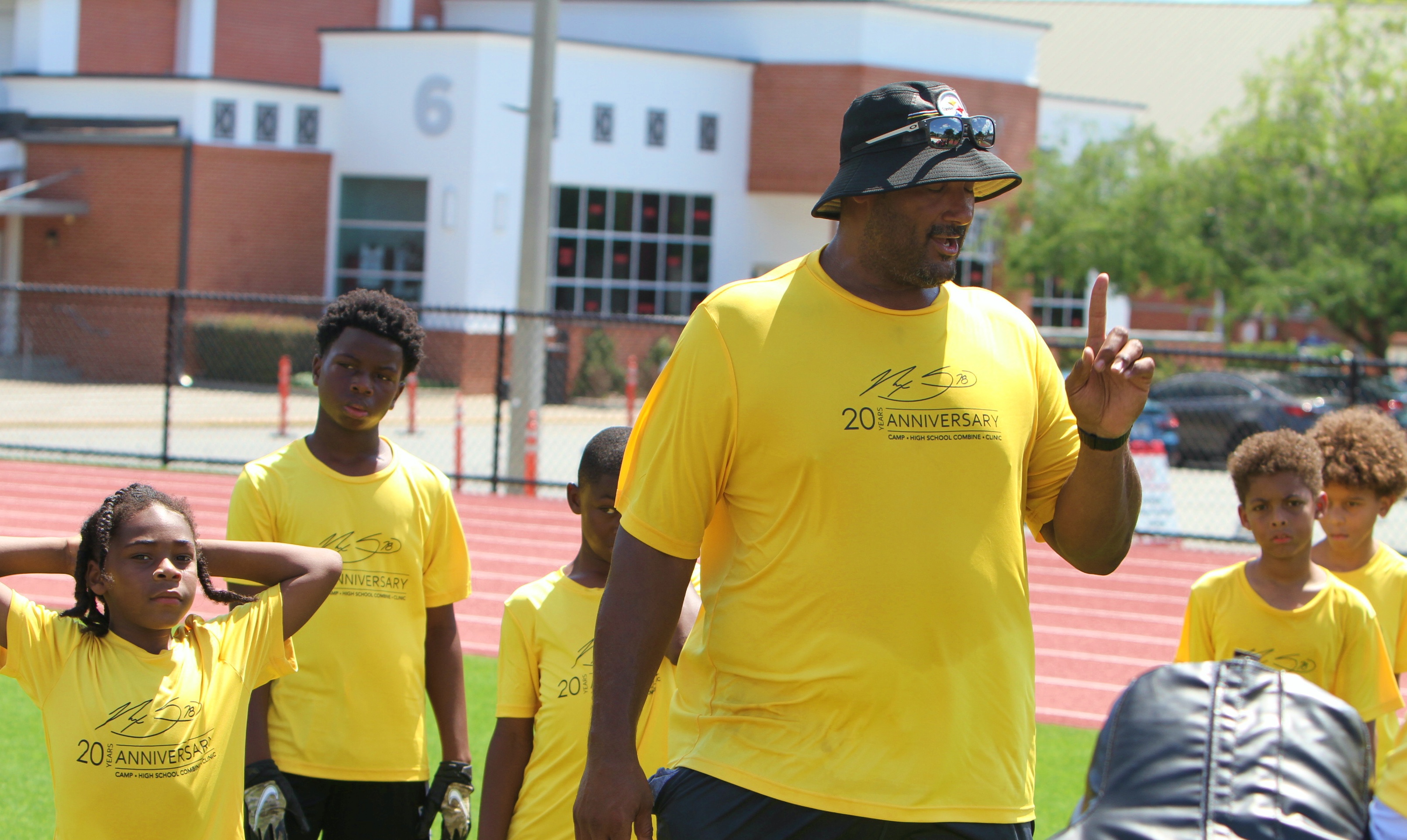 Youngsters go through drills at the 20th Annual Max Starks...