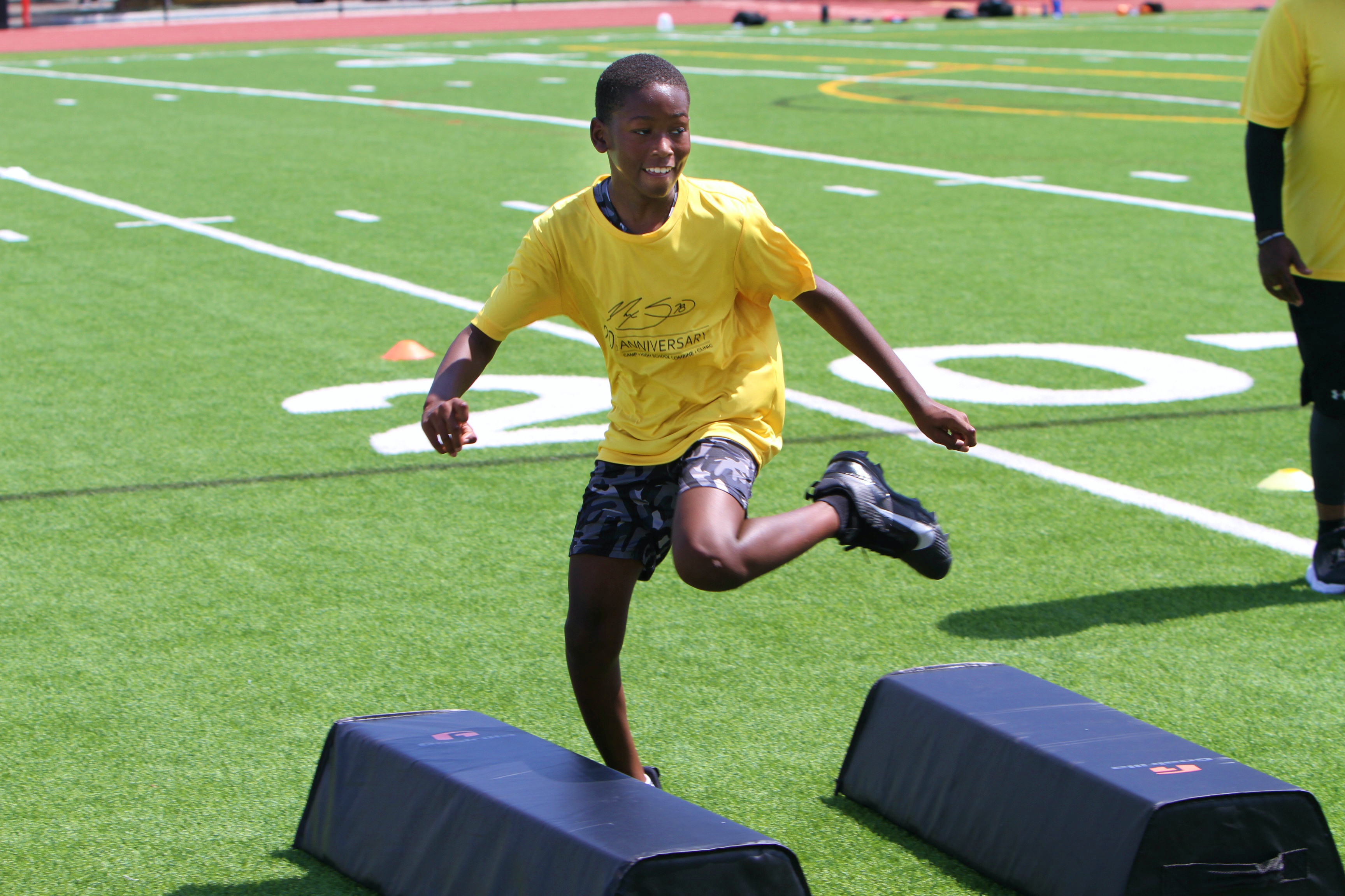 Youngsters go through drills at the 20th Annual Max Starks...