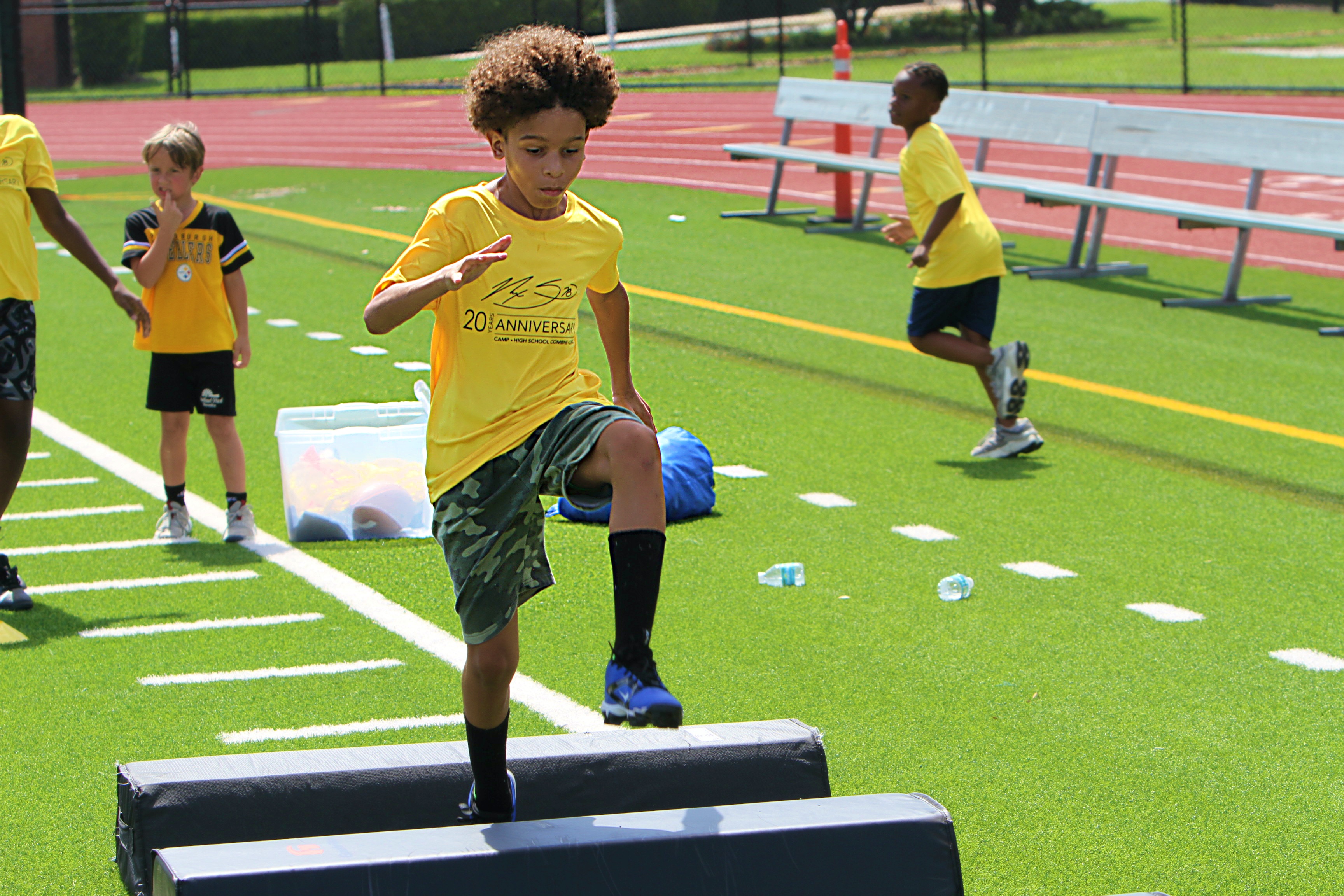 Youngsters go through drills at the 20th Annual Max Starks...