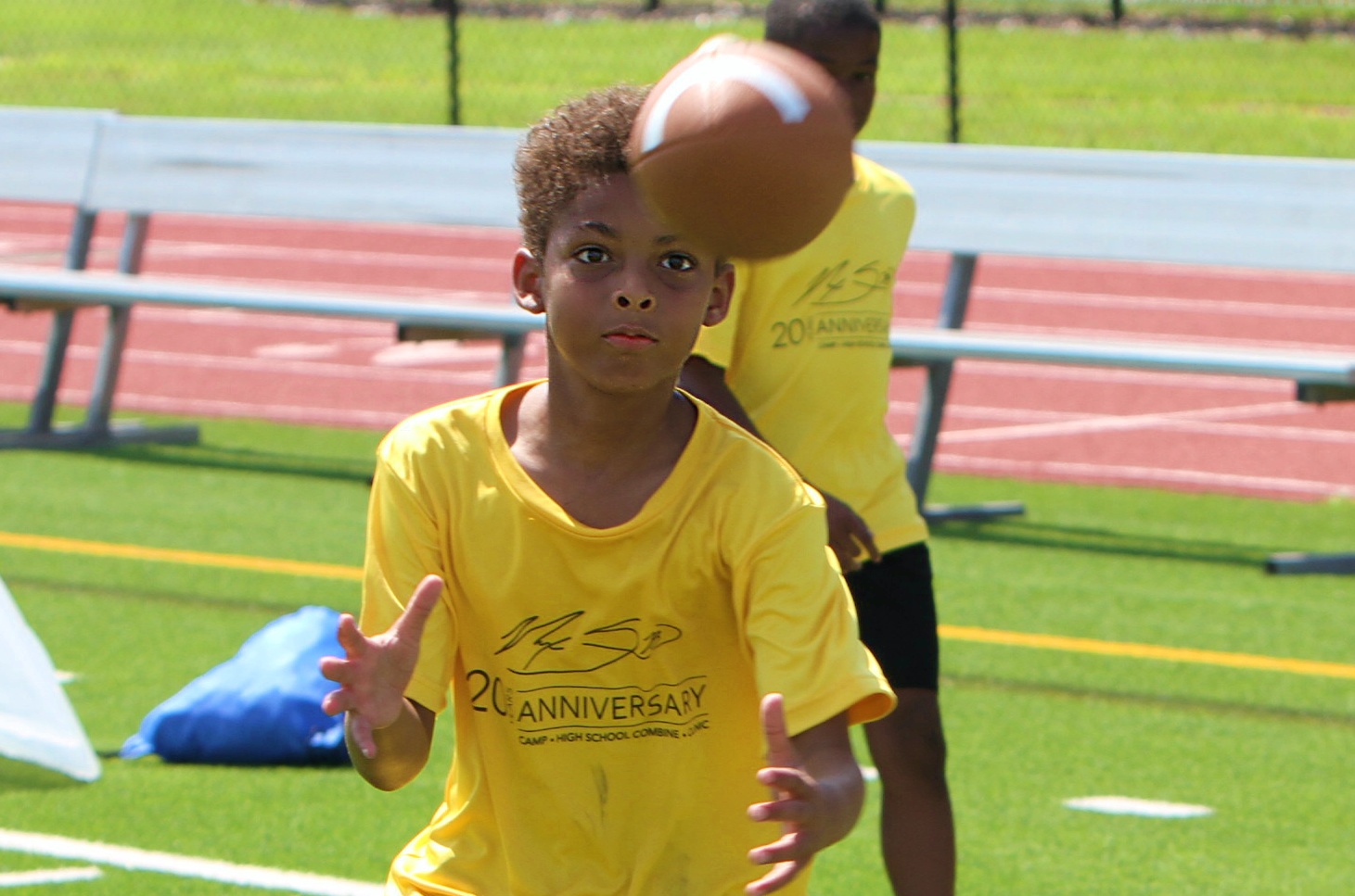 Youngsters go through drills at the 20th Annual Max Starks...