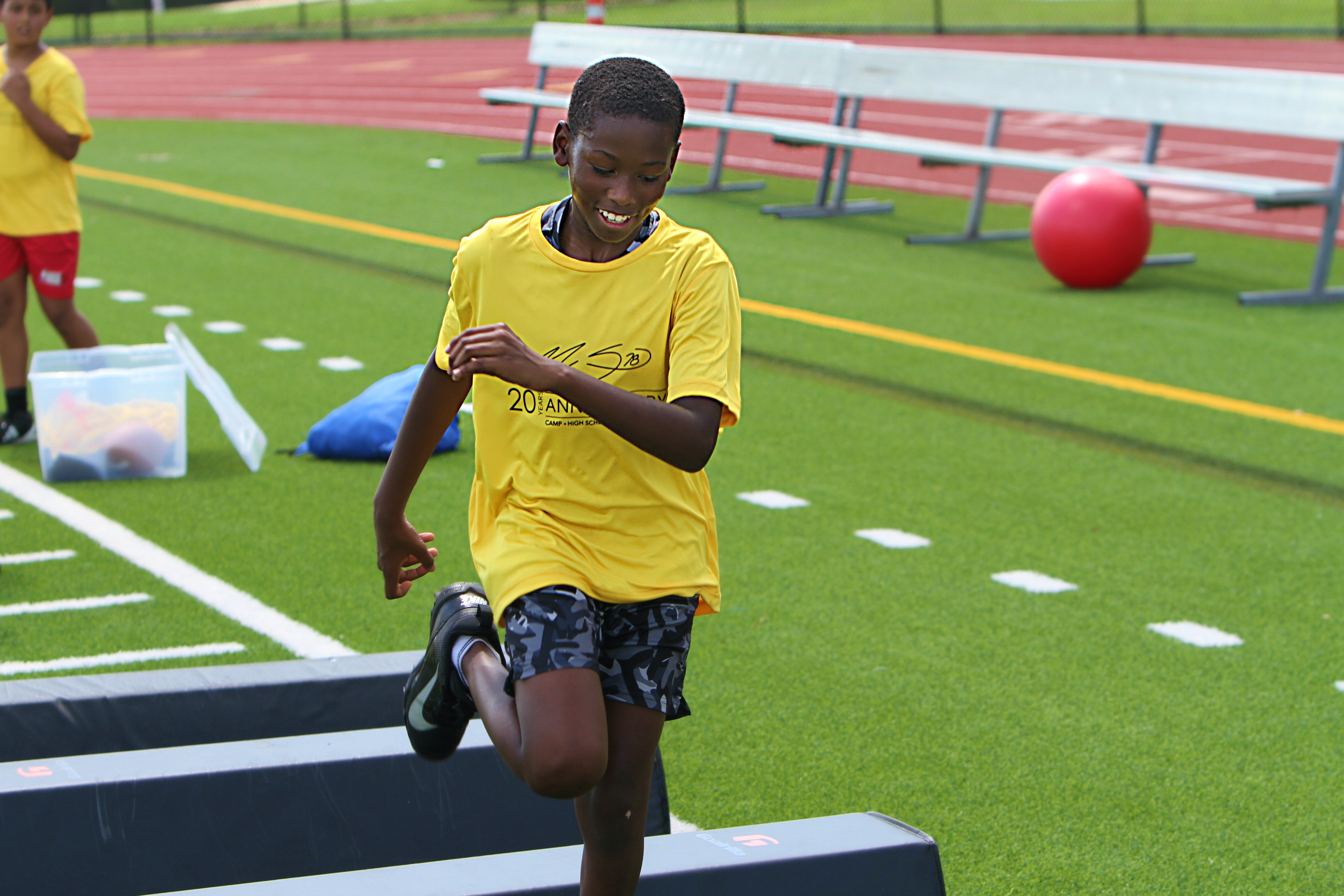 Youngsters go through drills at the 20th Annual Max Starks...