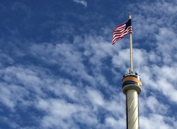 The American flag flies above the Sky Tower at SeaWorld Orlando. (Dewayne Bevil/Orlando Sentinel)
