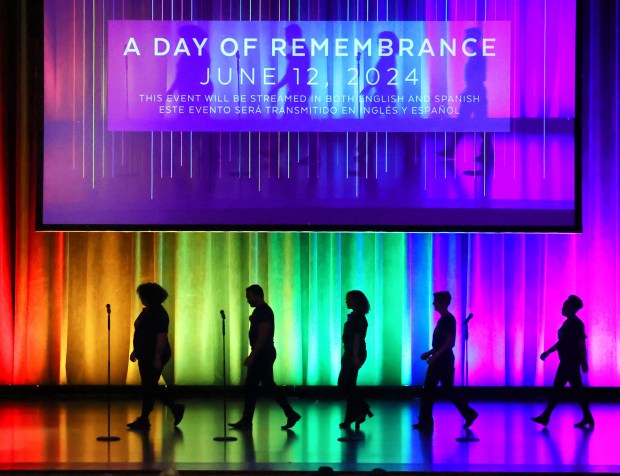 Singers from the Orlando Gay Chorus take the stage to perform in 2024 during a remembrance ceremony honoring those killed in the Pulse nightclub massacre. (Joe Burbank/Orlando Sentinel)