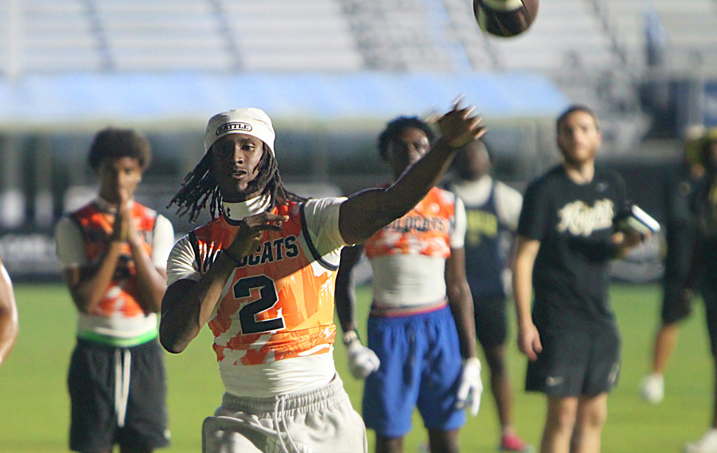 Winter Park senior quarterback Onrique Archie throws a touchdown pass...