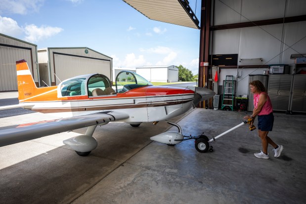 Doralisa Sherrod moves her 1979 Grumman Tiger at the Orlando-Apopka Airport on May 27, 2026. Sherrod will compete in the Air Race Classic, an event featuring all female pilots. (Patrick Connolly/Orlando Sentinel)