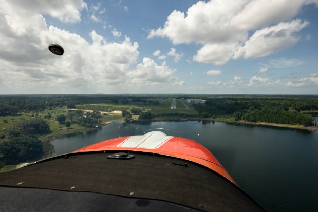 Doralisa Sherrod flies her 1979 Grumman Tiger to the Umatilla Municipal Airport for gas on May 27, 2026. Sherrod will compete in the Air Race Classic, an event featuring all female pilots. (Patrick Connolly/Orlando Sentinel)