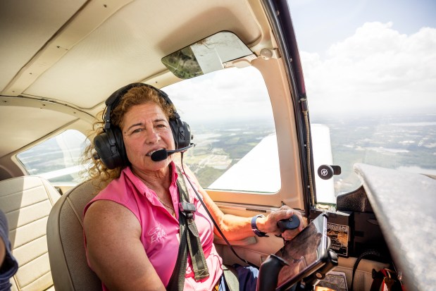 Doralisa Sherrod flies her 1979 Grumman Tiger near Apopka on May 27, 2026. Sherrod will compete in the Air Race Classic, an event featuring all female pilots. (Patrick Connolly/Orlando Sentinel)