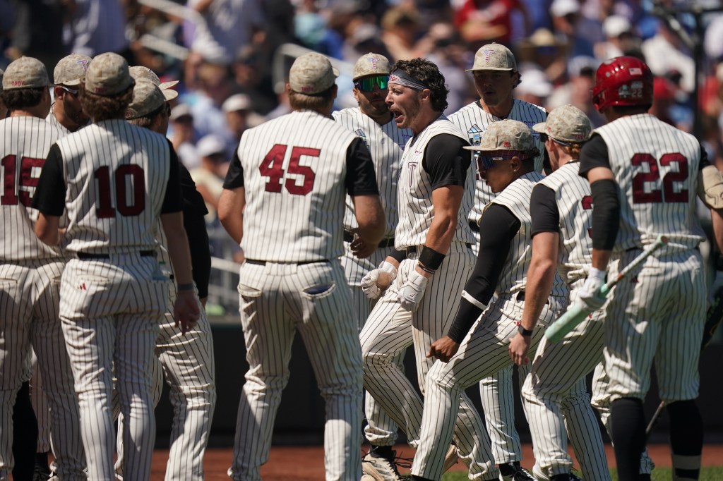 Troy ramps up its offense to rally for 12-8 win that knocks Mississippi out of College World Series