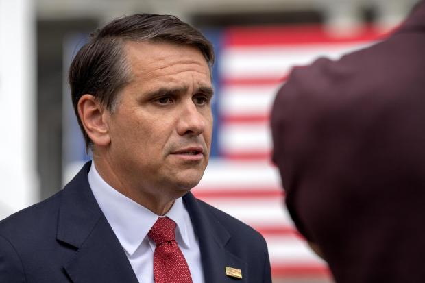Acting Attorney General Todd Blanche speaks to a reporter outside the White House, Wednesday, May 27, 2026, in Washington. (AP Photo/Mark Schiefelbein)