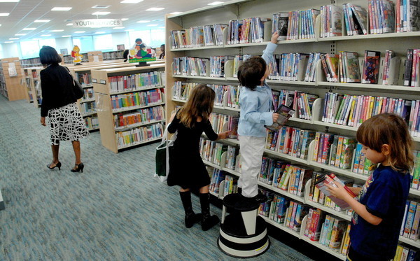 The West regional Library at 8601 W. Broward Blvd in Plantation. The $21.5 million library will have 200,000 publications , books , CDs videos, as well as a large multi-purpose room. The 72.000 square foot facility is triple the size of the old library that it replaced.