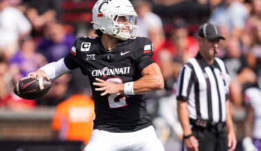 Sep 13, 2025; Cincinnati, Ohio, USA; Cincinnati Bearcats quarterback Brendan Sorsby (2) throws a pass for a touchdown against the Northwestern State Demons in the first half at Nippert Stadium.