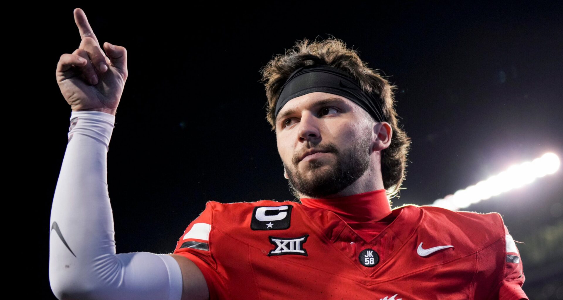 Oct 25, 2025; Cincinnati, Ohio, USA; Cincinnati Bearcats quarterback Brendan Sorsby points to fans as he walks off the field after defeating the Baylor Bears at Nippert Stadium.