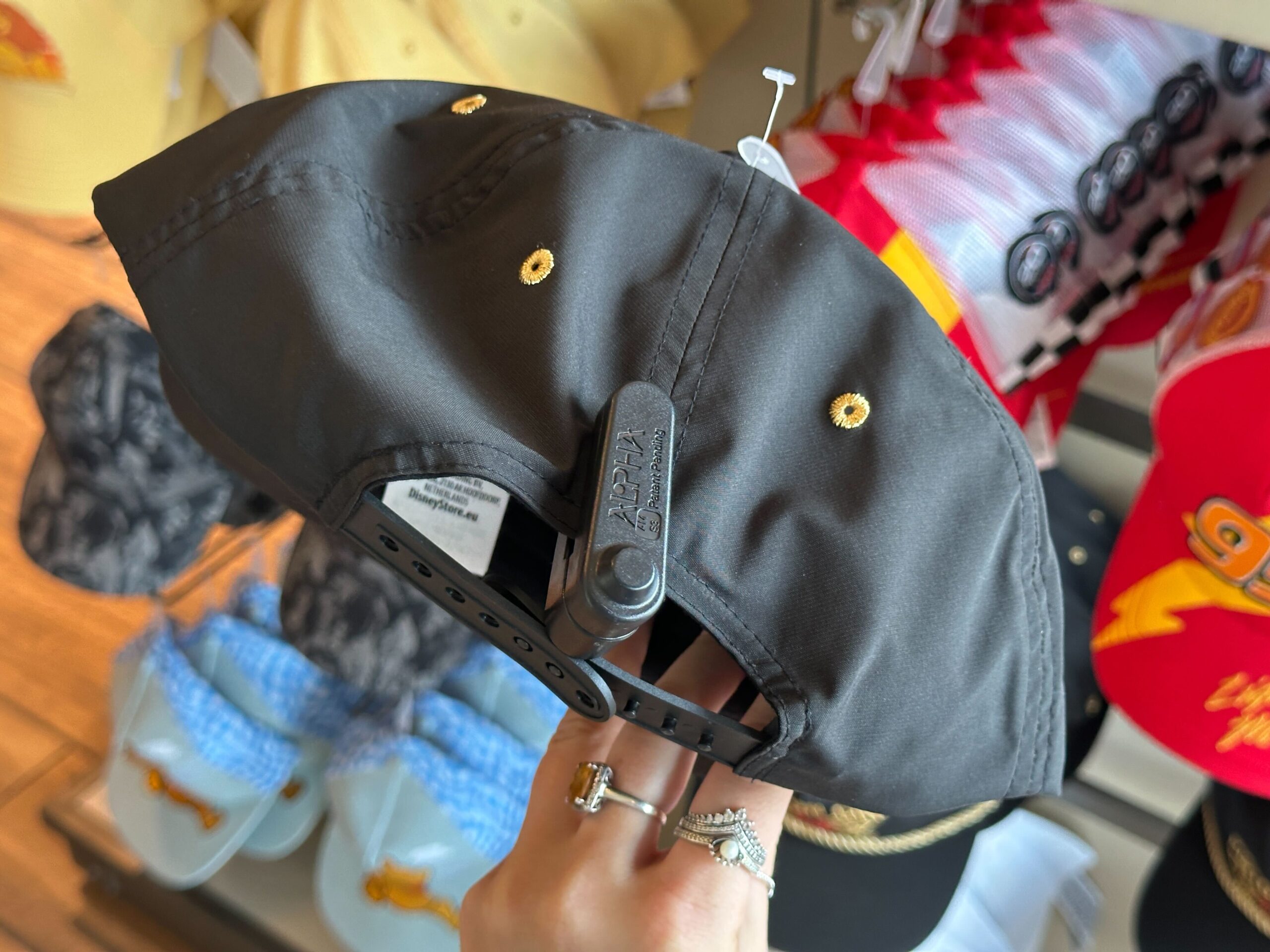 New Mater and Piston Cup Hats Race Into World of Disney at Disney Springs