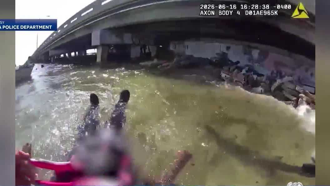 VIDEO: Two adults rescued from overturned boat in Tampa