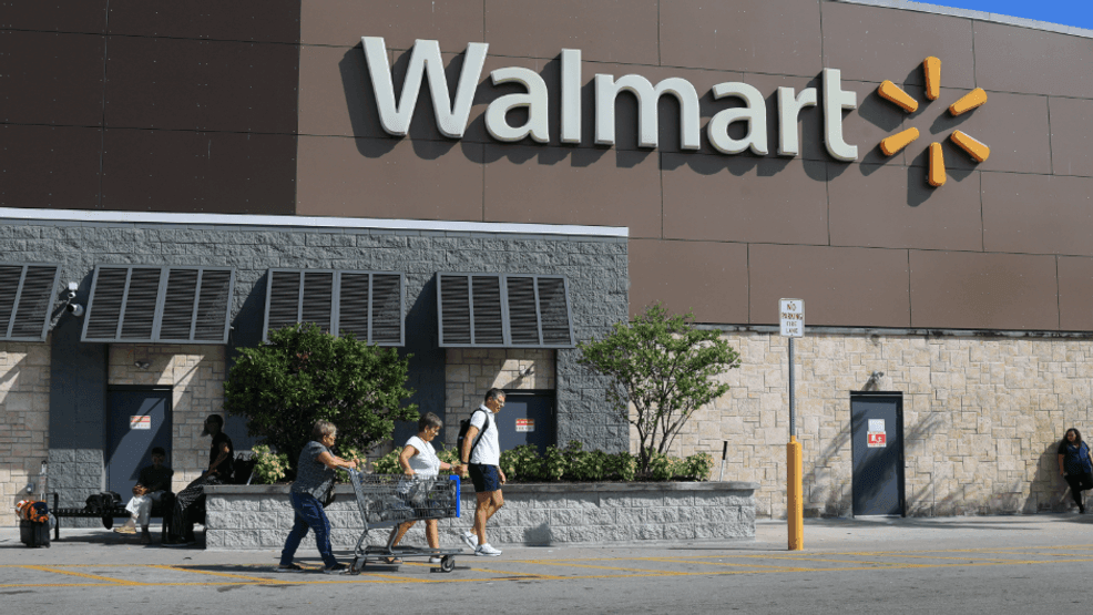 HOLLYWOOD, FLORIDA - NOVEMBER 20: A Walmart sign hangs on the exterior of the store on November 20, 2025 in Hollywood, Florida. The retailer reported earnings per share of 62 cents and revenues of $179.5 billion through its latest quarter, sending the stock up more than 5.6% to above $106 shortly after trading opened. (Photo by Joe Raedle/Getty Images)