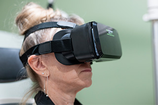 Patient wears VR glasses