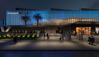 Entrance rendering of the proposed MOSI Fieldhouse showing retail space and public gathering areas.