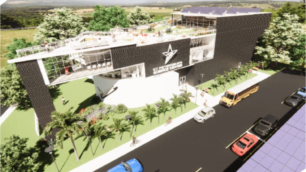 Rendering of the proposed St. Petersburg Science Center redevelopment showing a multi-story AI and education campus with a rooftop event space, restored rotunda, outdoor gathering areas and school bus access.