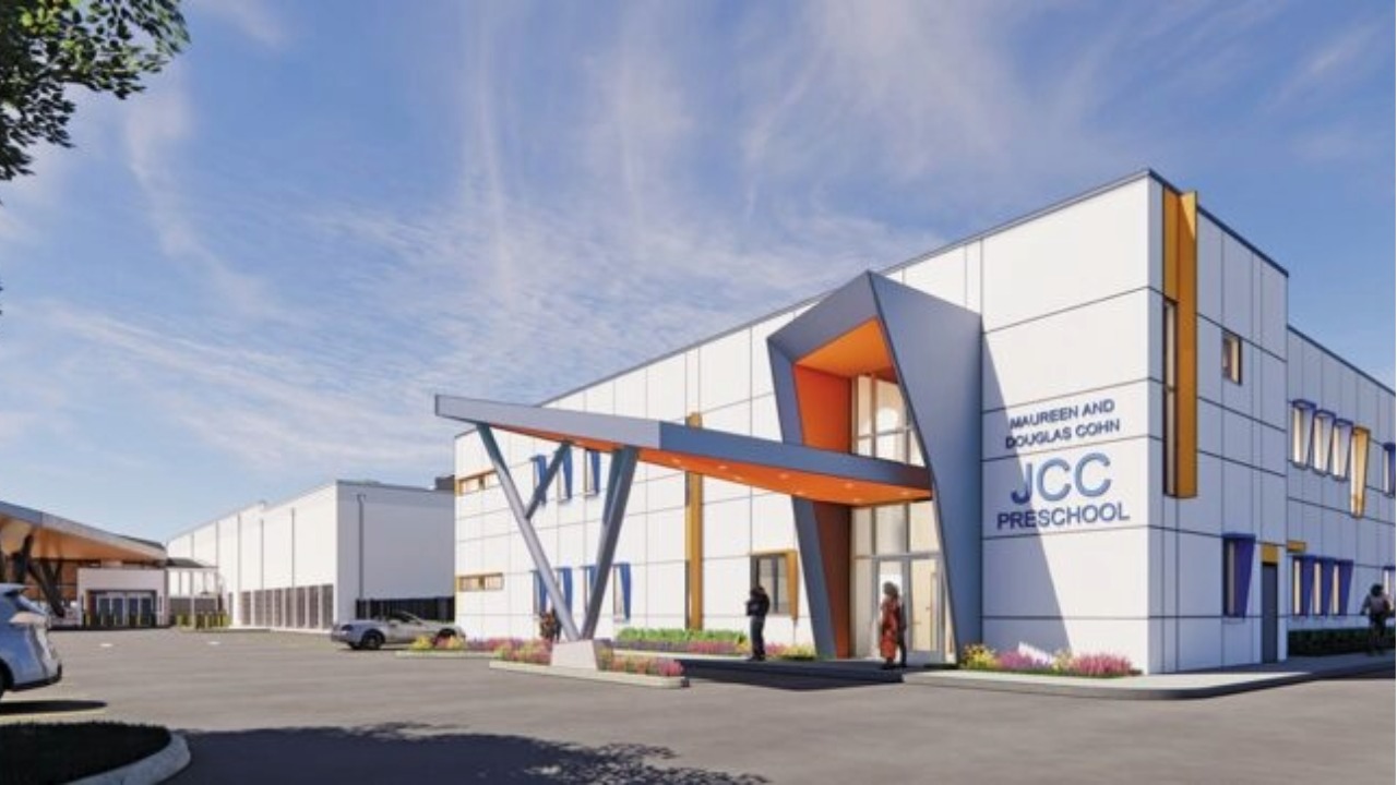 Rendering of the proposed JCC Preschool at the Tampa JCC campus, showing the main entrance, covered drop-off area and two-story classroom building.