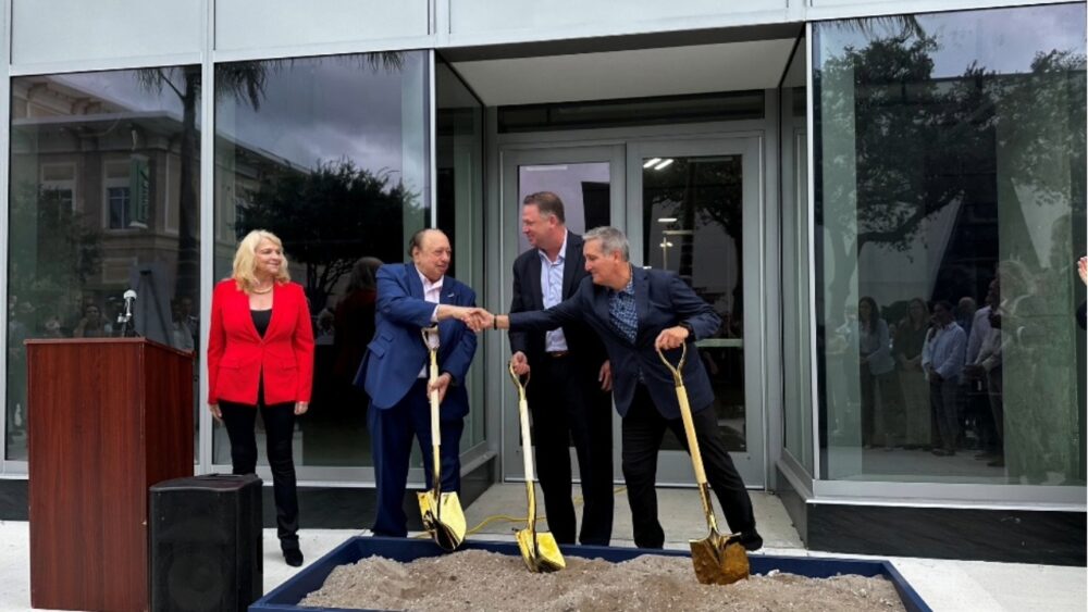 Executives from Dynasty Financial Partners and Red Apple Group participate in a groundbreaking ceremony outside 400 Central in downtown St. Petersburg.