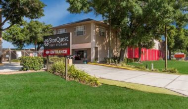 StorQuest Self Storage facility at 5002 S. Manhattan Ave. in South Tampa, featuring the entrance sign, office building and drive-up storage units.