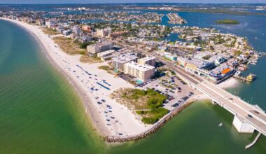 Aerial view of Madeira Beach showing Gulf Boulevard, John's Pass Village and the Gulf of Mexico shoreline.