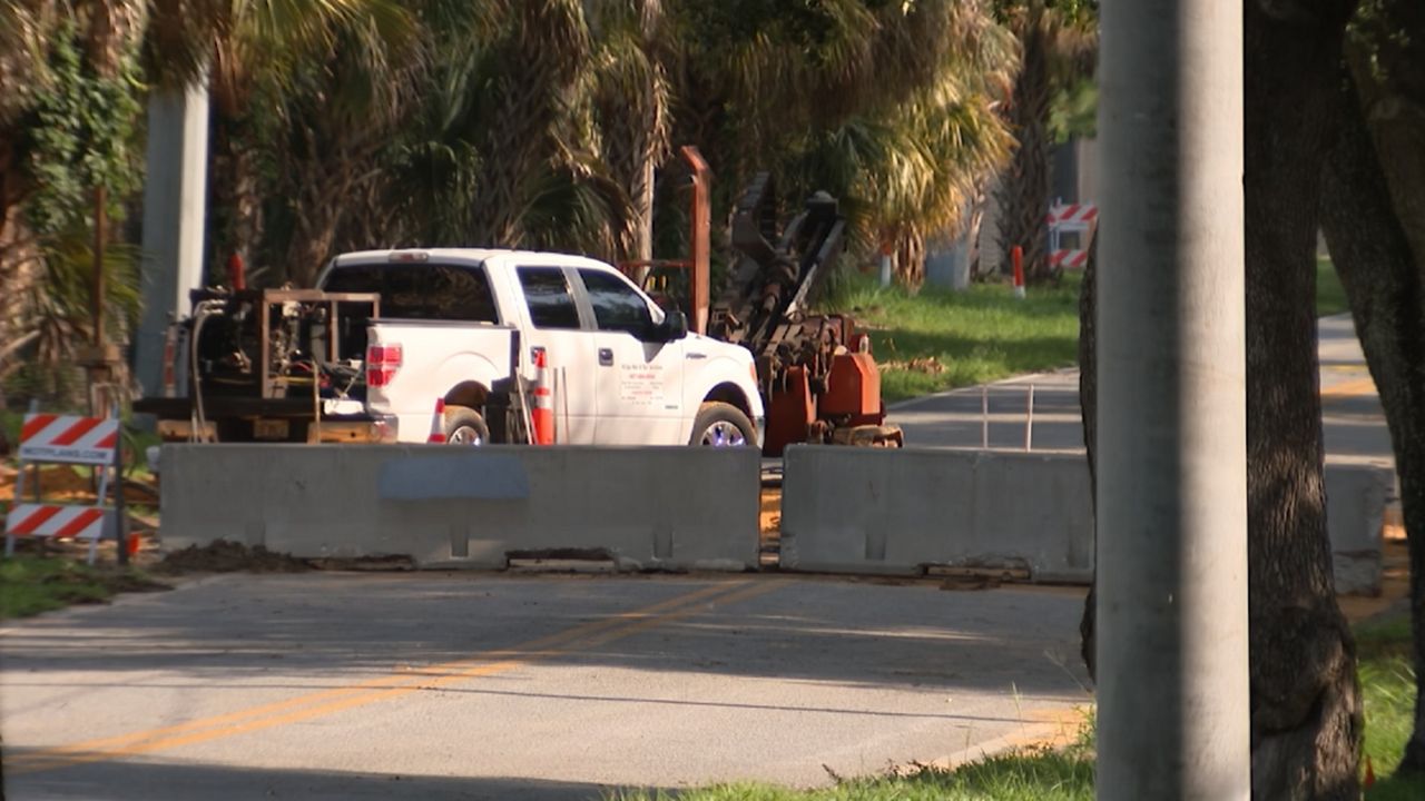 Contractors are stabilizing the ground near the sinkhole on Wymore Road in Maitland before repairs can start. (Spectrum News/Ben Boocker)