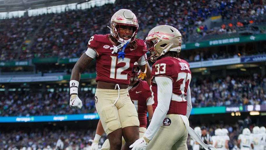 Edwin Joseph celebrates a tackle against Georgia Tech with defensive back Conrad Hussey