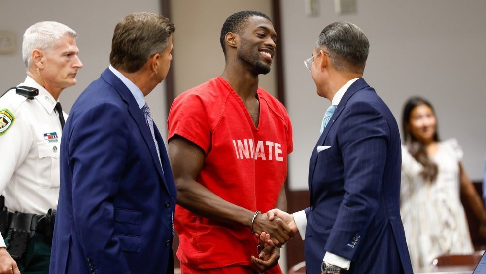 Terrion Arnold, a Detroit Lions cornerback, shakes hands with his attorneys R. Timothy Jansen, left, and A.J. Alvarez, during the conclusion of his pretrial detention hearing at the Hillsborough County Courthouse on Monday, June 29, 2026, in Tampa, Fla. (Jefferee Woo/Tampa Bay Times via AP)