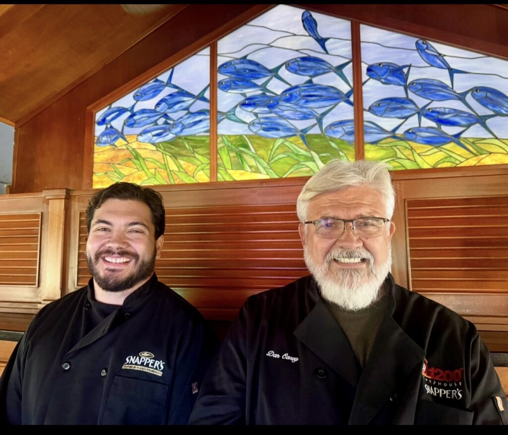 Two men inside a restaurant