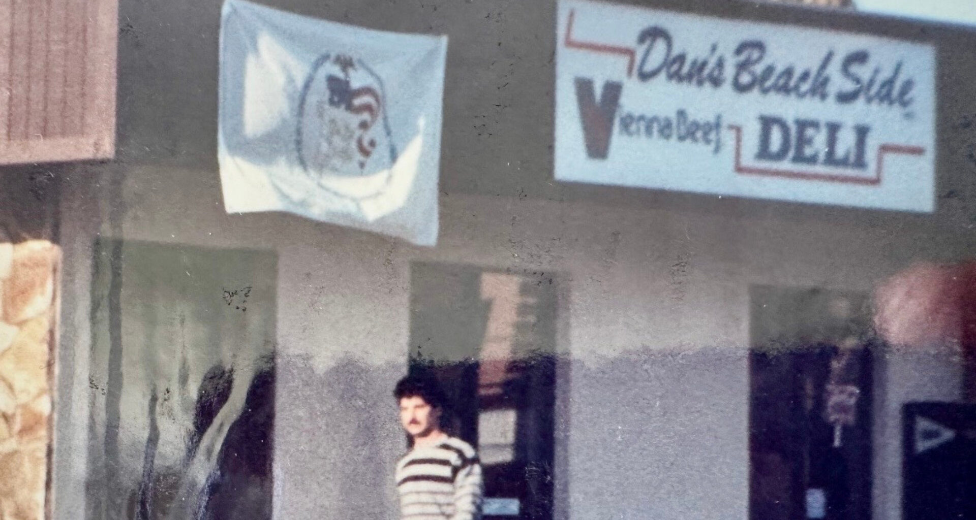 A person outside a restaurant