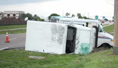 USPS truck rolls over in crash in Cape Coral