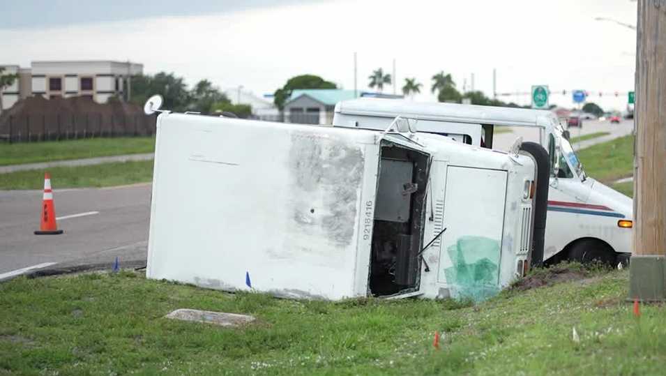 USPS truck rolls over in crash in Cape Coral