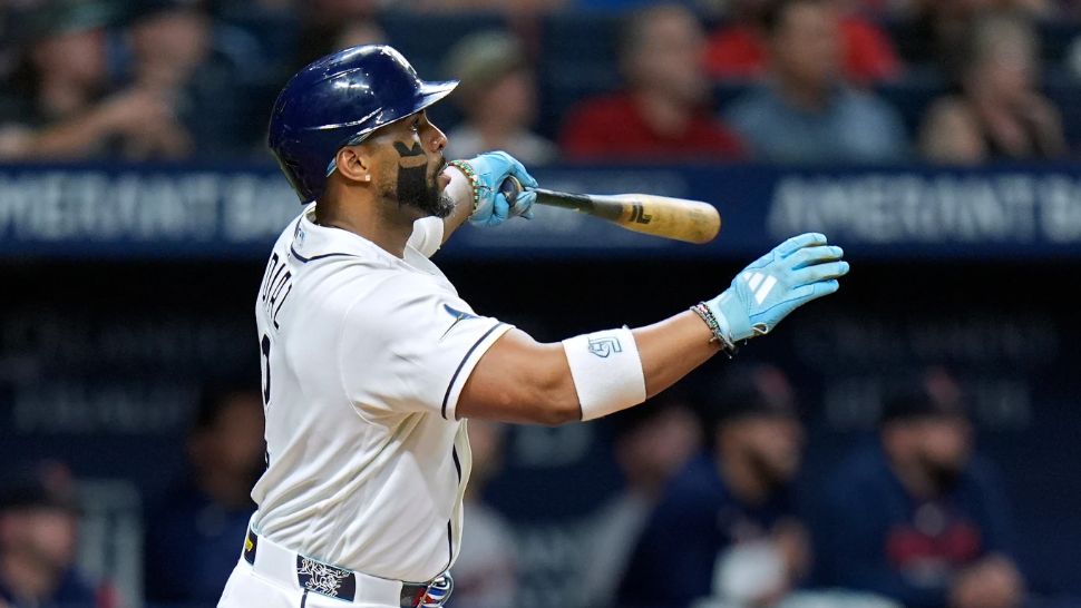 Tampa Bay Rays' Yandy Díaz watches his run scoring sacrifice fly off Boston Red Sox's Alec Gamboa during the eighth inning of a baseball game Monday, June 8, 2026, in St. Petersburg, Fla. (AP Photo/Chris O'Meara)