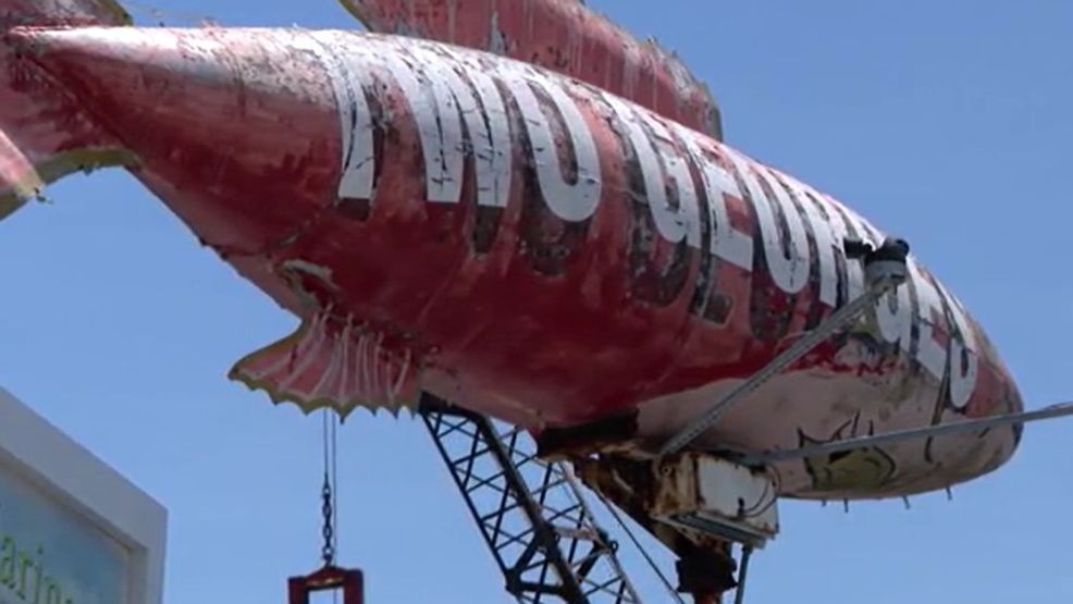 Another piece of the restaurant’s history is also hiding in plain sight. Janet Naughton said this red-looking sign outside with the words “Two Georges” on it is actually an external fuel tank from a World War II aircraft.