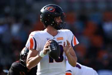 Jack Plumer throwing a football Jack Plumer throwing a football