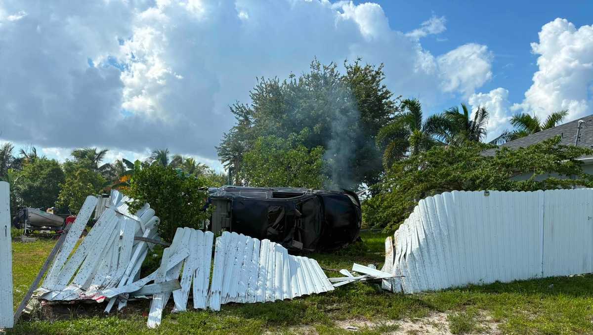 At least 1 injured after car rolls over, crashes into fence near Cape Coral home