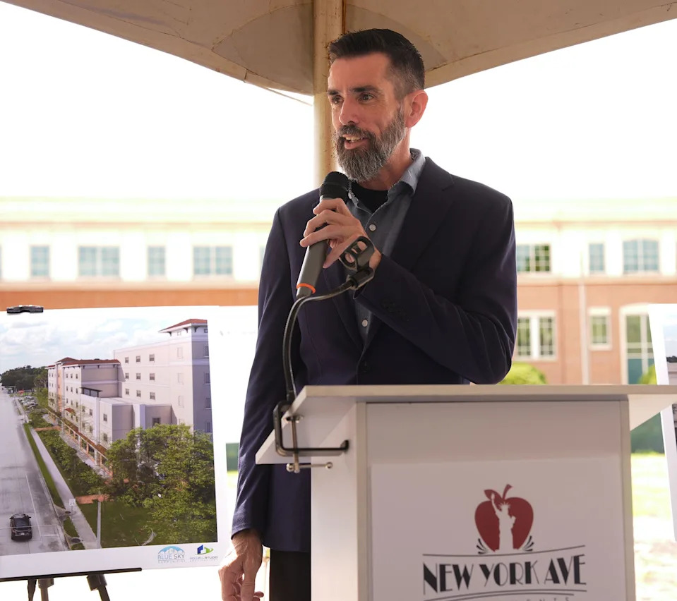 DeLand Mayor Chris Cloudman speaks during the groundbreaking ceremony for the New York Avenue Apartments on March 31, 2026, in downtown DeLand.