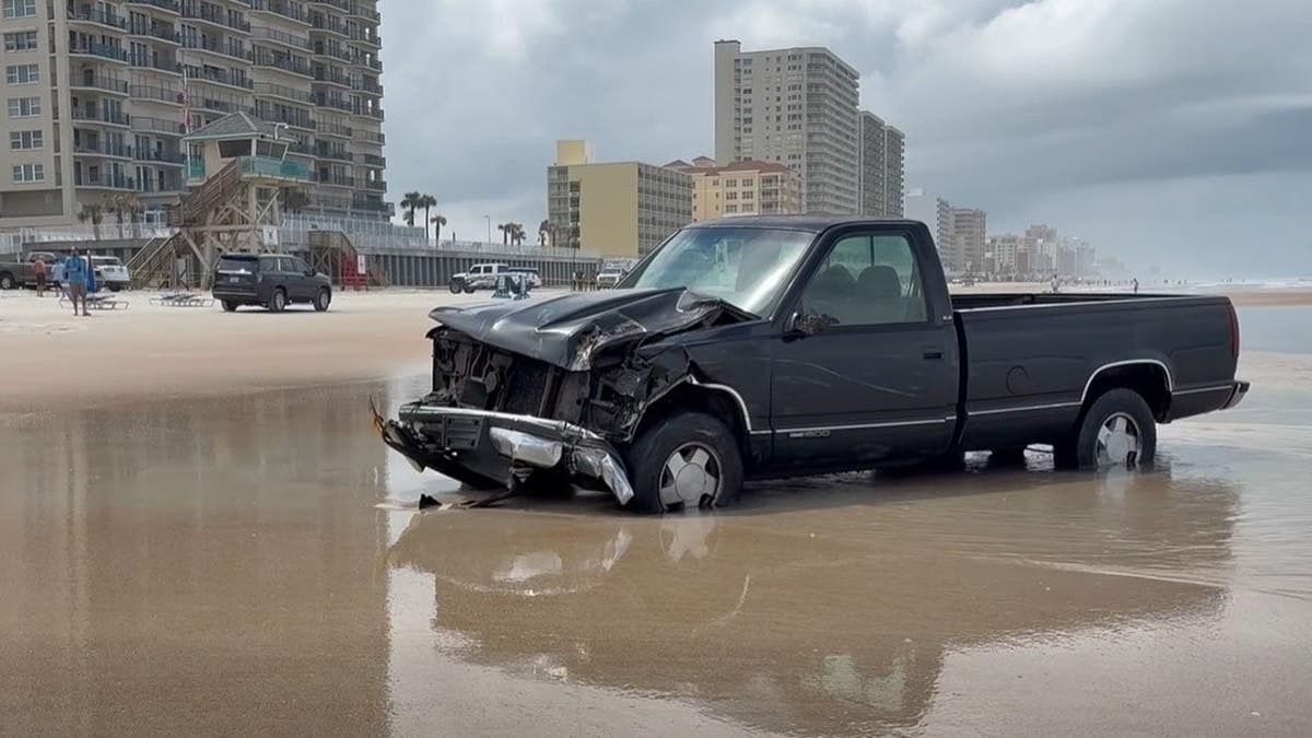 A truck stuck in the ocean